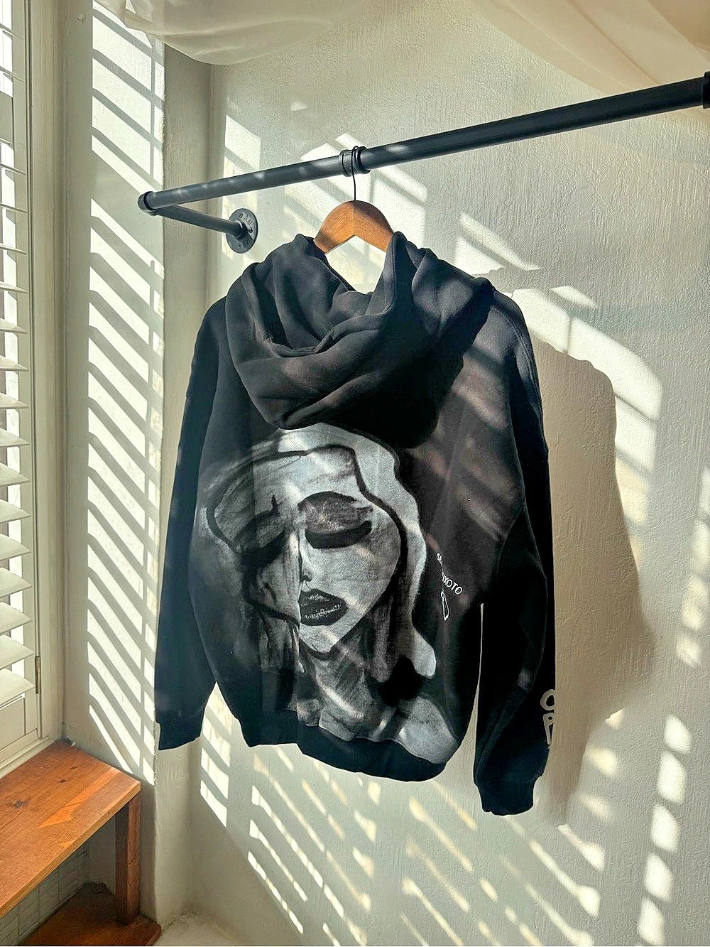 Graphic Pullover Hoodie in Black Like New
